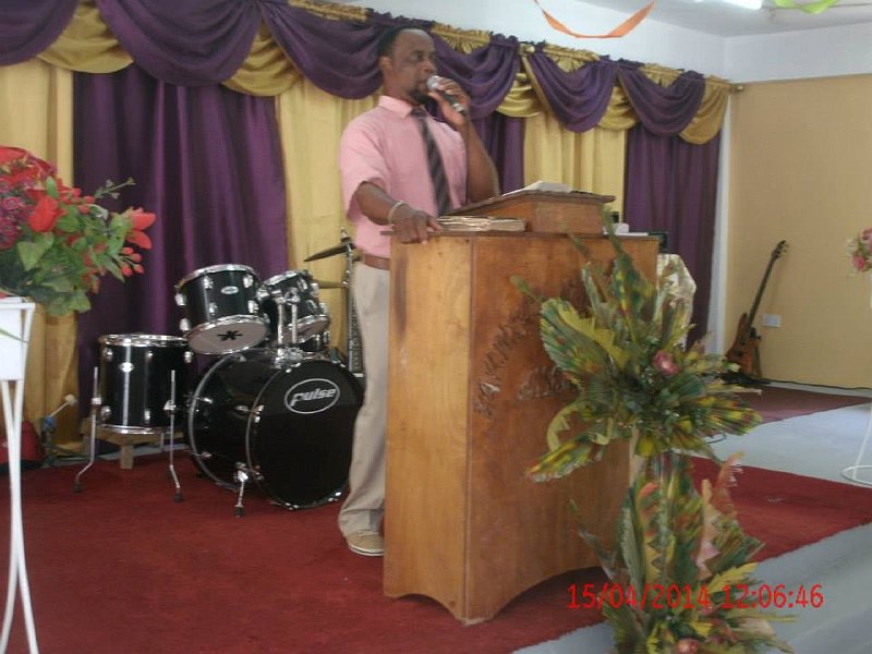 Elder George Jno. Baptiste ministering the Word